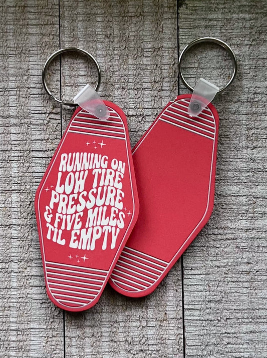 running on low tire pressure & five miles til empty | keychain