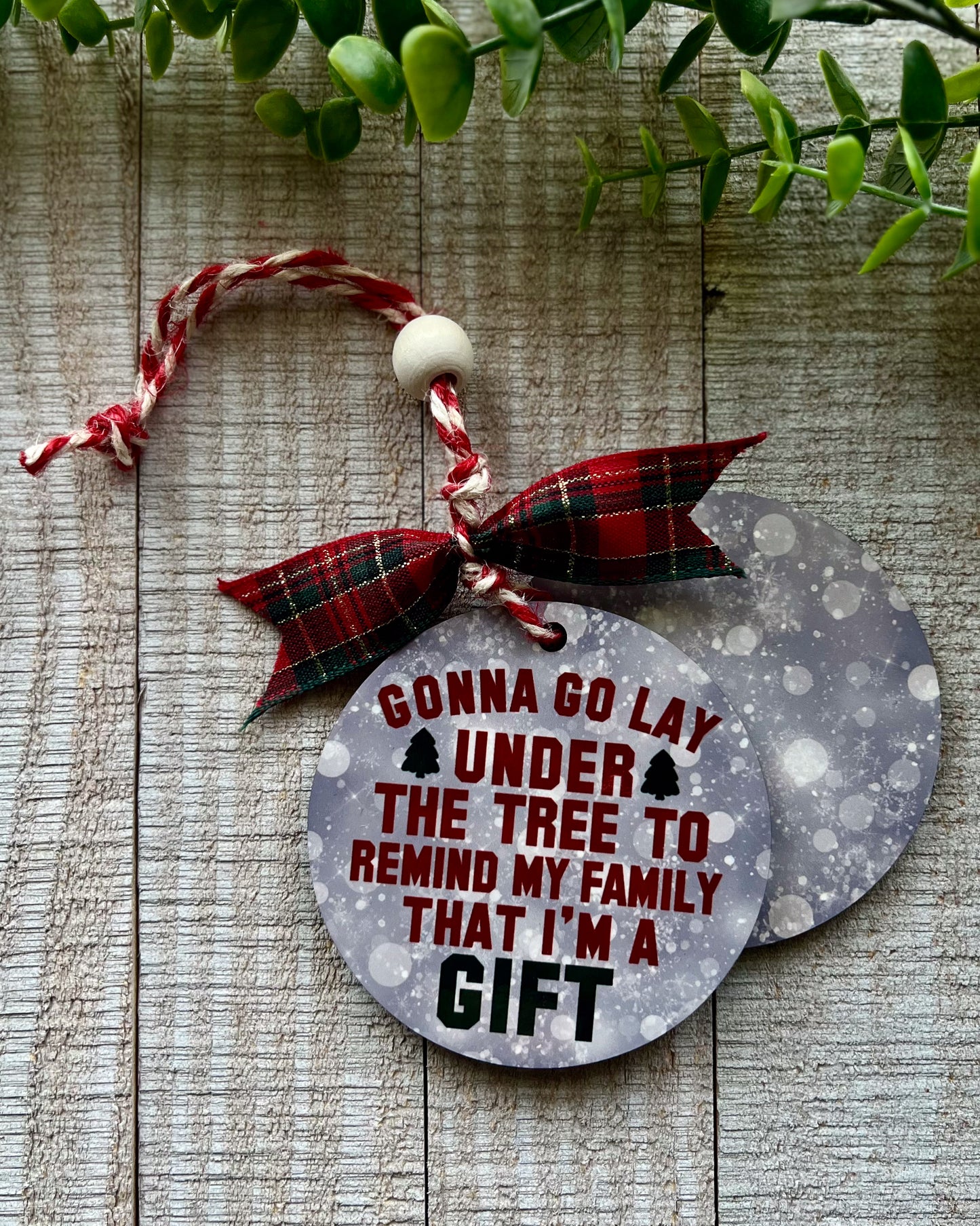 gonna go lay under the tree to remind my family that i'm a gift | christmas ornament