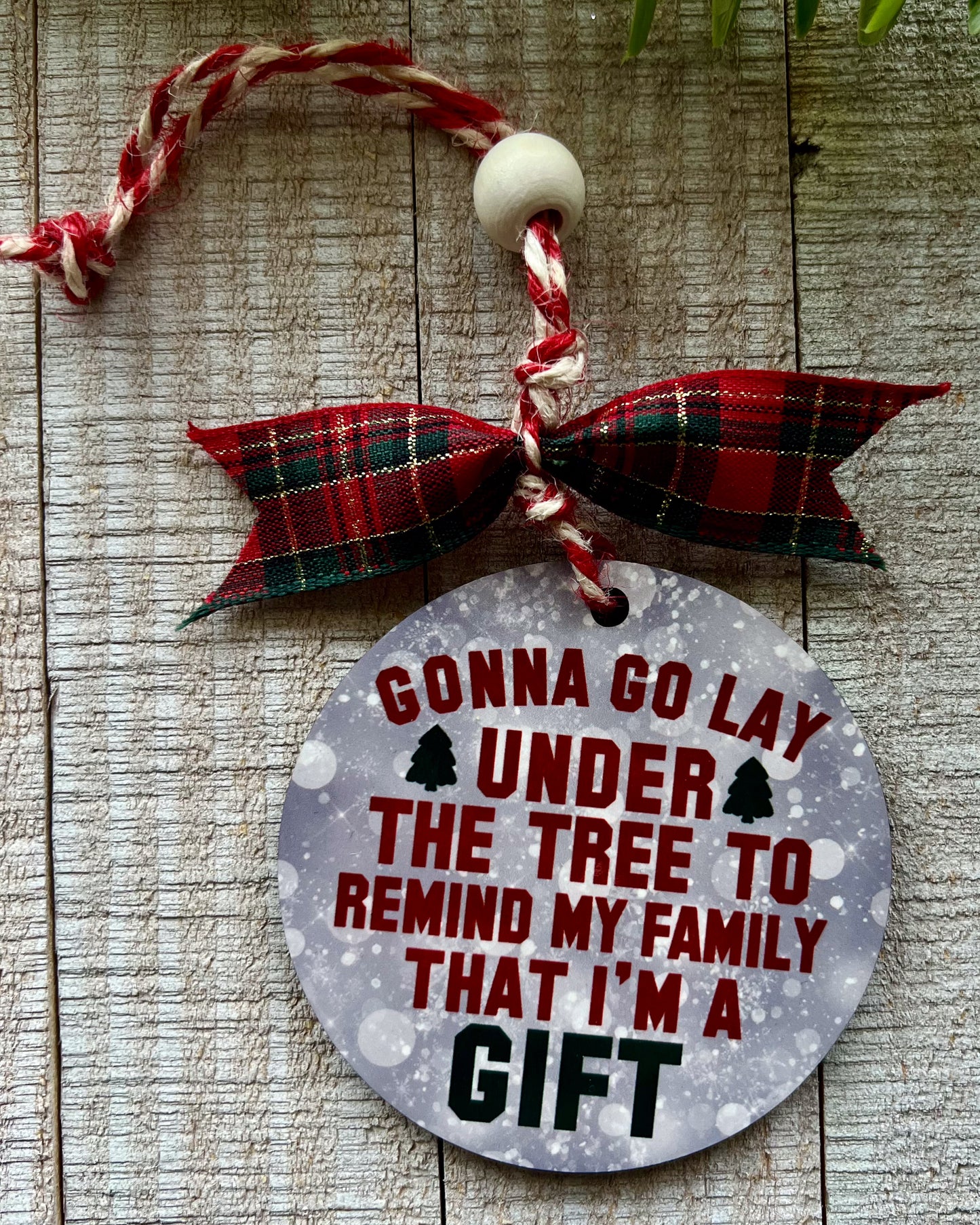 gonna go lay under the tree to remind my family that i'm a gift | christmas ornament