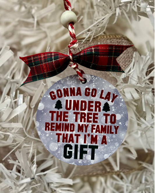 gonna go lay under the tree to remind my family that i'm a gift | christmas ornament